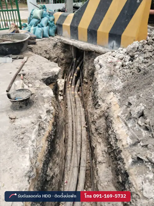 สายไฟใต้ดินหลายวงจรในร่อง ตรวจสอบก่อนกลบ